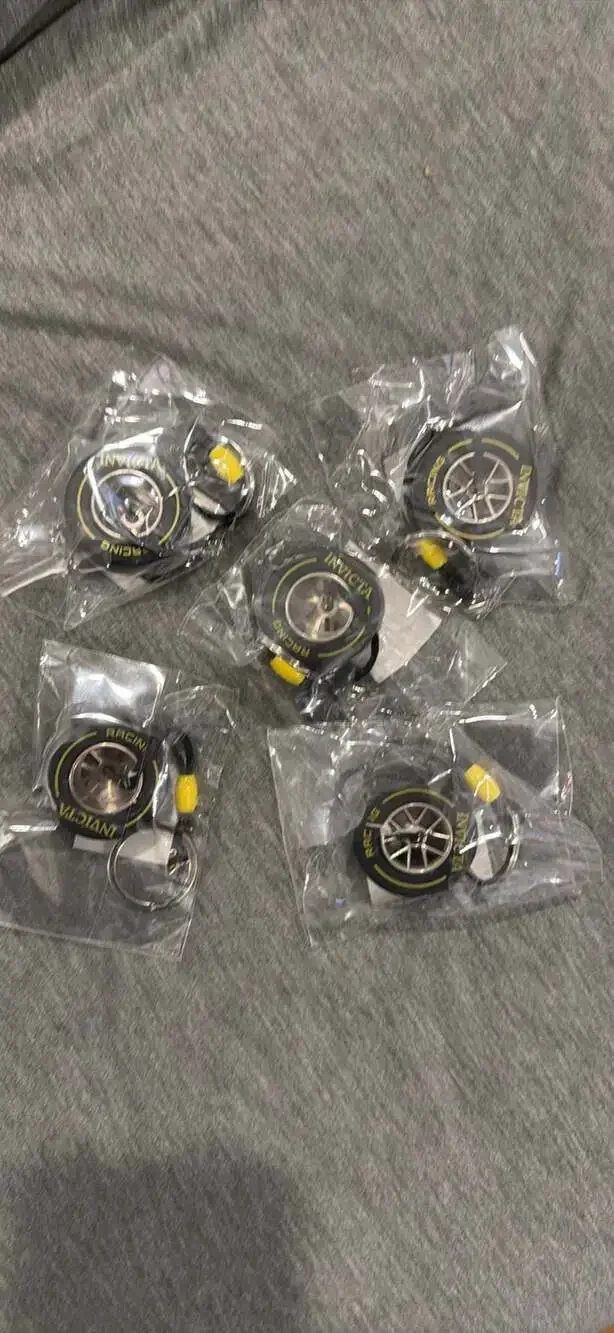 Invicta Racing F1 Rubber Medium Tire Yellow Striped Keychain IG0346